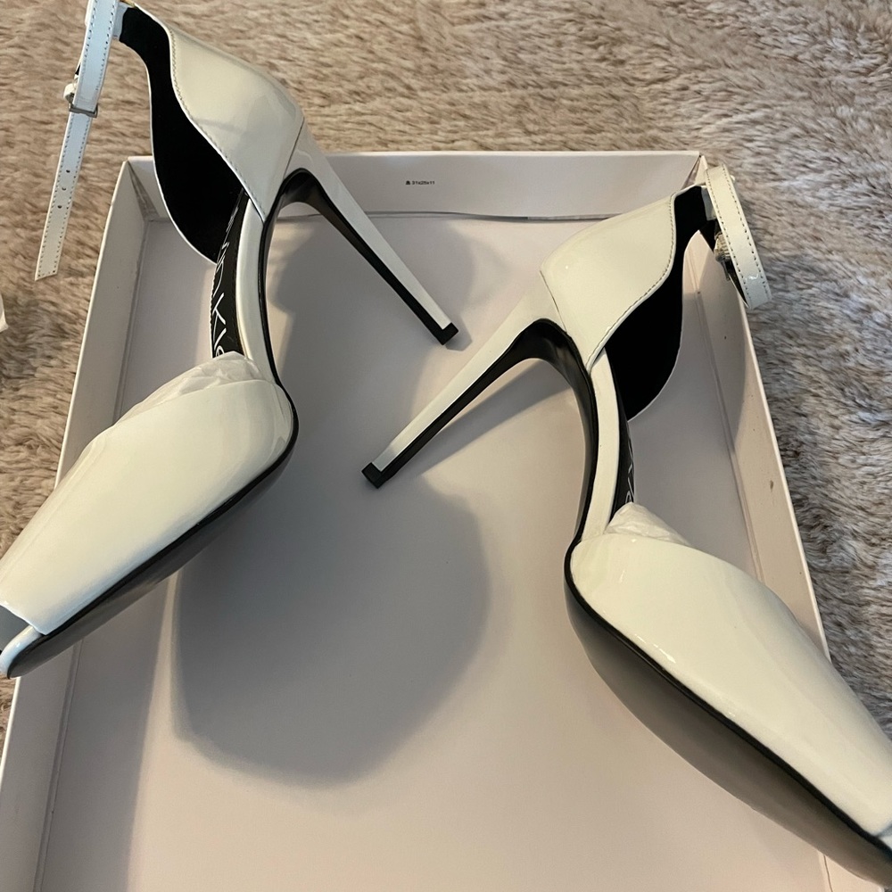 Calvin Klein open toe heels! Never worn before. Size 9 NIB